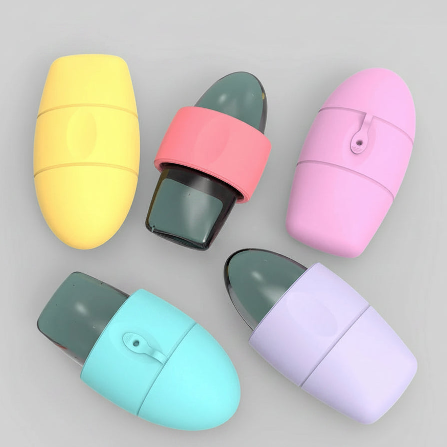 Ice roller for face in yellow, pink, and purple on a light green background